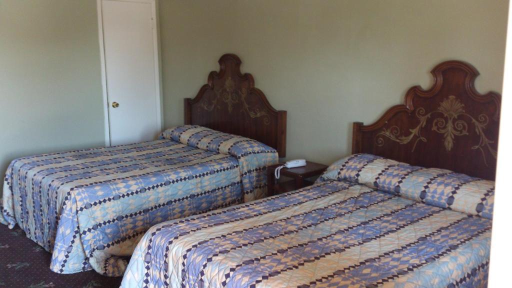 Santa Ana Travel Inn Pokoj fotografie