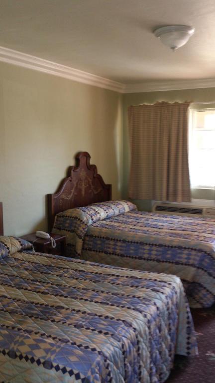 Santa Ana Travel Inn Pokoj fotografie